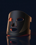 RubyMask black-gold LED face mask on navy